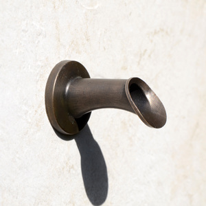 Tiny Oona fountain spout with traditional patina