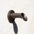 Tiny-Oona fountain spout with traditional patina